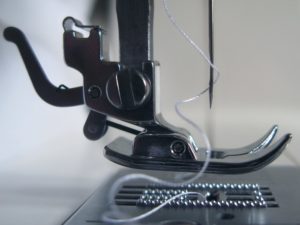 what type of shuttle in a sewing machine is which is better